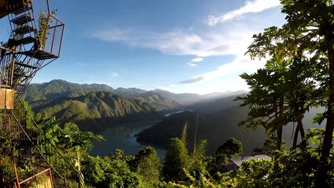 Cordillera mountain range, huge river below Stock-Footage 79546212