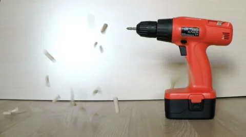 Cordless drill and falling dowels Video stock 53190305