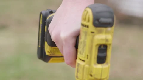 Cordless drill blending ceiling texture compound. Stock Footage 149794338