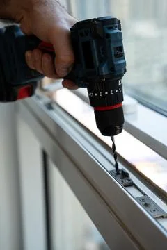 Cordless Drill Installing Window Frame, In-use DIY Photo Descrip Stock Photos