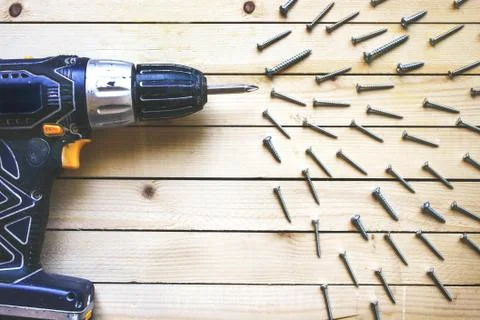 Cordless drill with screws Stock Photos
