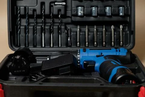 Cordless drill toolkit with essentials for home projects Stock Photos