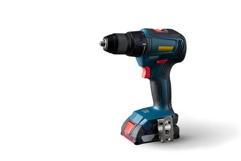 Cordless drill on a white background. Isolated Close-up. Stock Photos
