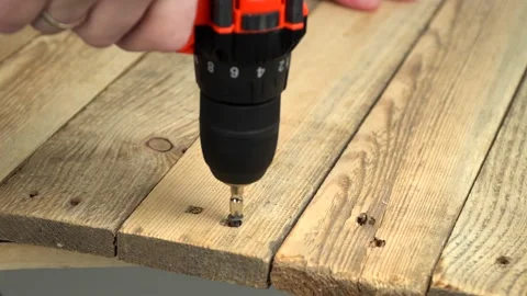 Cordless hand drill driver with auger bit, close-up Stock Footage 152934339