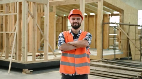 Cordless impact driver in hand. Industrial worker in wooden warehouse Stock Footage 296001453