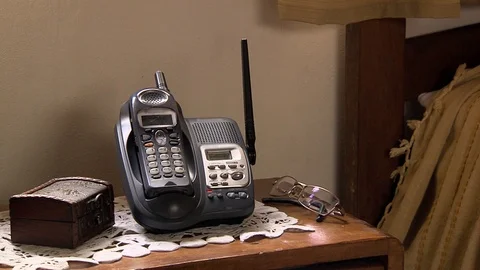 Cordless Phone on the Bedside Table, Close-Up, Zoom In Stock Footage 91629738