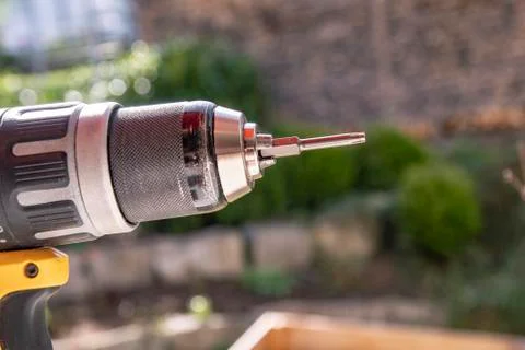 Cordless screwdriver with torx bit in close-up for do-it-yourselfers and hobb Stock Photos