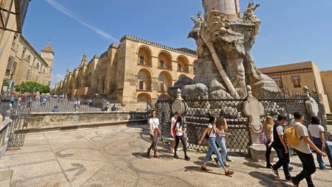 Cordoba, Spain. Circa June 2018. Tourists and locals walking with Saint Raphael 库存影片 90992453