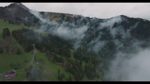 Cordon - Mystical Mountain Flight Through Clouds - 4K Stock Footage 276103244