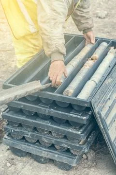 Core drill worker extracts core samples 2 Stock Photos
