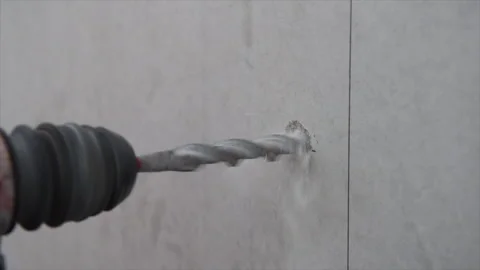 Core drilling concrete wall with a big drill bit Stock Footage 271621757