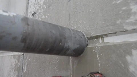 Core drilling concrete wall with a big drill bit Stock Footage 271621966