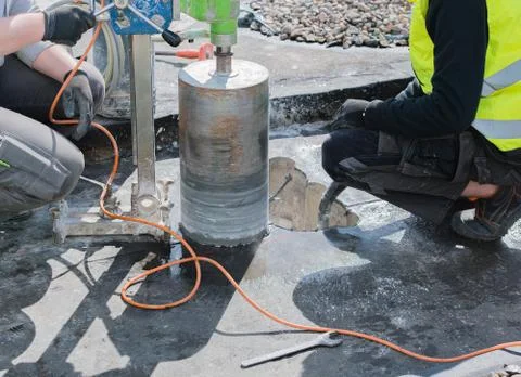 Core drilling through a building ceiling Stock-Fotos