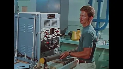 Core samples from deep beneath the ocean are submitted to various tests and Video stock 143856026