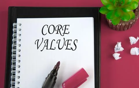 CORE VALUES - word in white notebook on red background Stock Photos