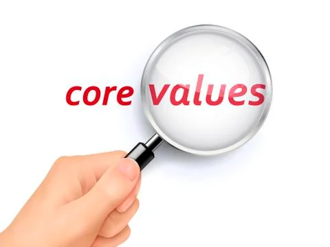 Core values words showing through magnifying glass Illustrazione stock