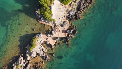 Corfu cape next to the shore prepared for wedding ceremony Aerial Drone View Stock-Footage 334029441