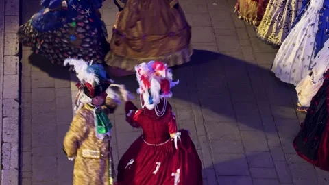 Corfu Carnival Greece night parade. High angle view of couple in elaborate Stock Footage 330867579