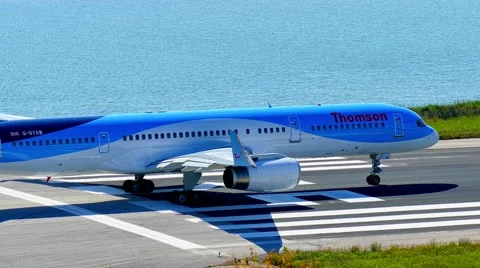 CORFU, GREECE – JUNE 2 2016: Kerkira Airport 4k video. Plane rides runway Stock Footage 66607928