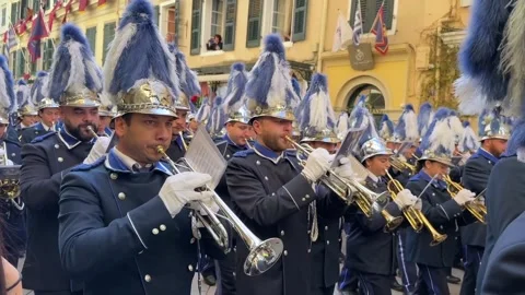 Corfu Greece marching band playing brass wind instruments on St Spyridon holiday Stock Footage 295018698