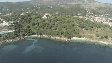 Corfu Island Port hidden beach luxury homes Panning Shot Stock Footage