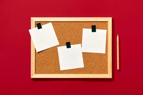 Cork board with blank notes and pencil Stock Photos