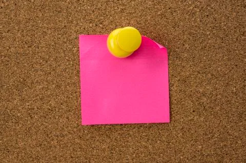 Cork board with pinned note Stock Photos