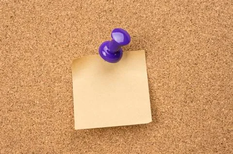 Cork board with pinned note Stock Photos