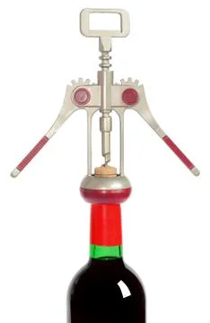Corkscrew and bottle. Stock Photos