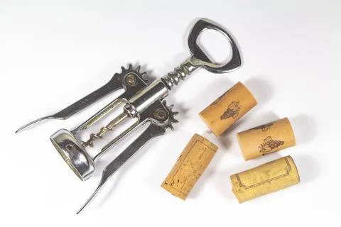Corkscrew and corks Stock Photos