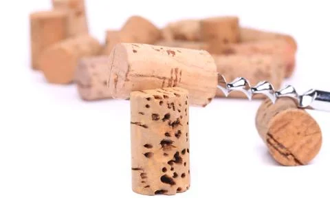 Corkscrew and wine corks Stock Photos
