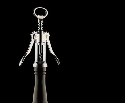The corkscrew on black background Stock Photos