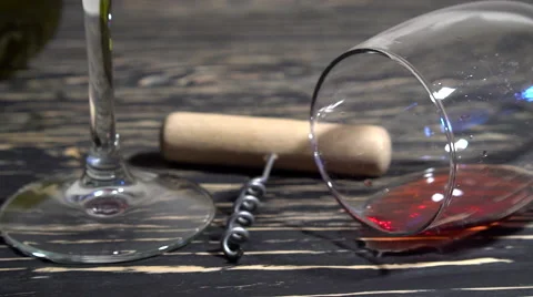 Corkscrew, cork, bottle and glass of red wine on a wooden table Vídeos de archivo 68836837