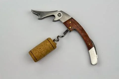 Corkscrew with cork Stock Photos