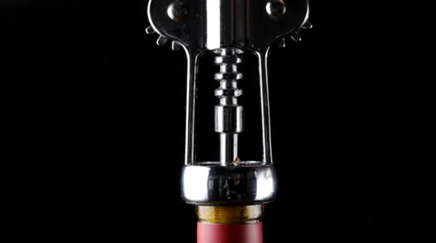 Corkscrew opening bottle of wine Stock Footage 31960867