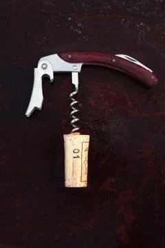 Corkscrew witk 01 signed cork, rusty dark bakground Stock Photos