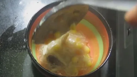Corn and chicken soup Stock Footage 70688687
