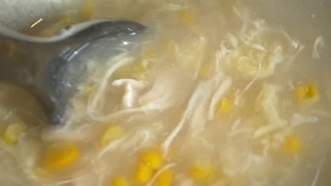 Corn and Egg Drop Soup in a bowl Stock Footage 327767984