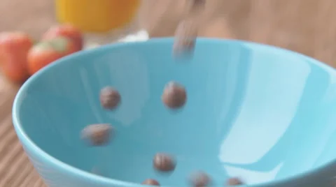 Corn balls pour in a bowl Stock Footage 68948990