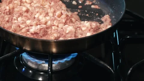 Corn beef hash cooking on gas stove Stock Footage 263354813