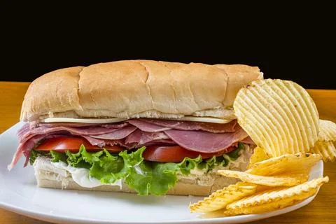 Corn beff  sub  with lettuce tomato and cheese Stock Photos