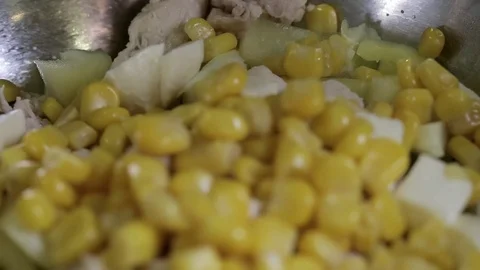 Corn in a bowl with salad very close up Stock Footage 101201825