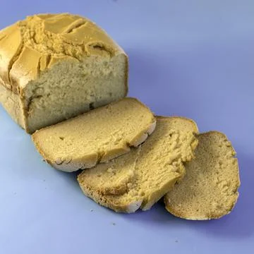 Corn bread. Homemade cornmeal bread on a blue background .Top view Stock Photos
