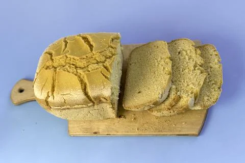 Corn bread. Homemade cornmeal bread on a blue background .Top view Stock Photos