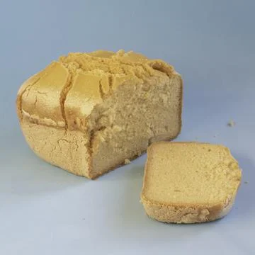 Corn bread. Homemade cornmeal bread on a blue background .Gluten Free. Stock Photos