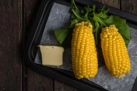 Corn with butter Stock Photos
