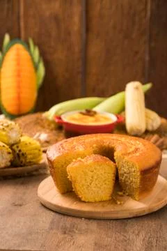 Corn cake on the table with typical Brazilian junina food Stock Photos