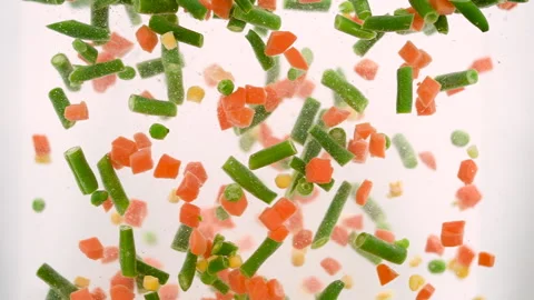 Corn, Carrots,Green Beans, Peas Falling into Water Stock Footage 195189087