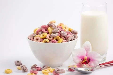Corn cereal breakfast flake in children cups and milk is a healthy breakfast  Stock Photos