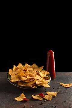 Corn chips with pepper and salt Foto stock